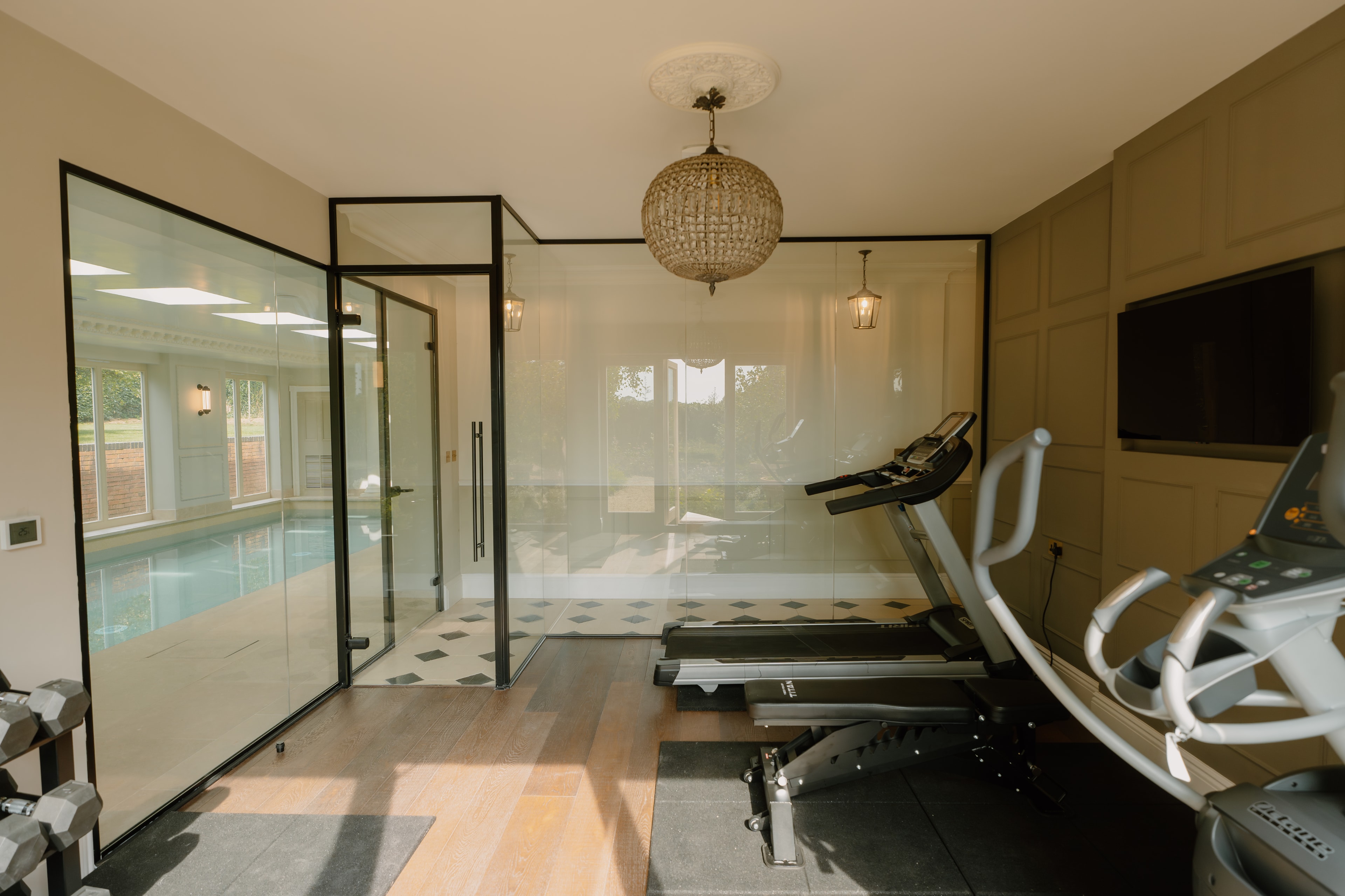 Gym with pool view